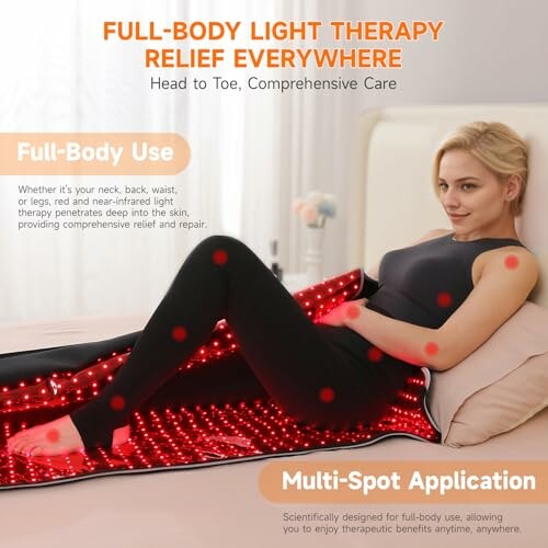 Person using a red light therapy mat for relief.